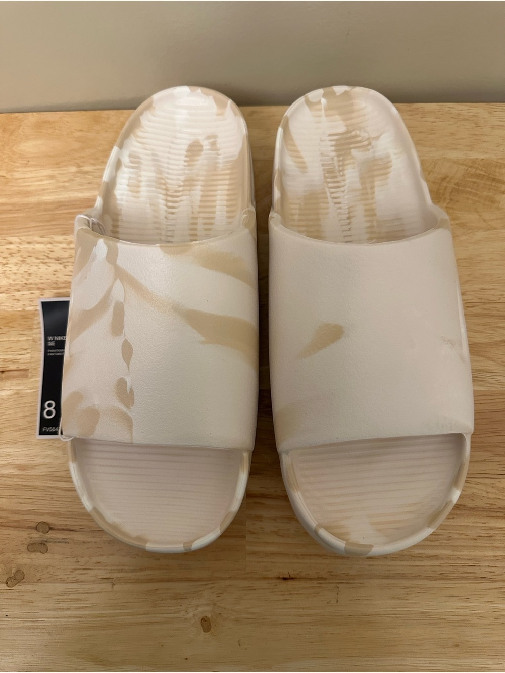 Nike Calm Slide SE in Cream and Tan Marbled Print